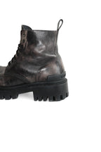 BALENCIAGA STRIKE WORN-OUT EFFECT BOOTS